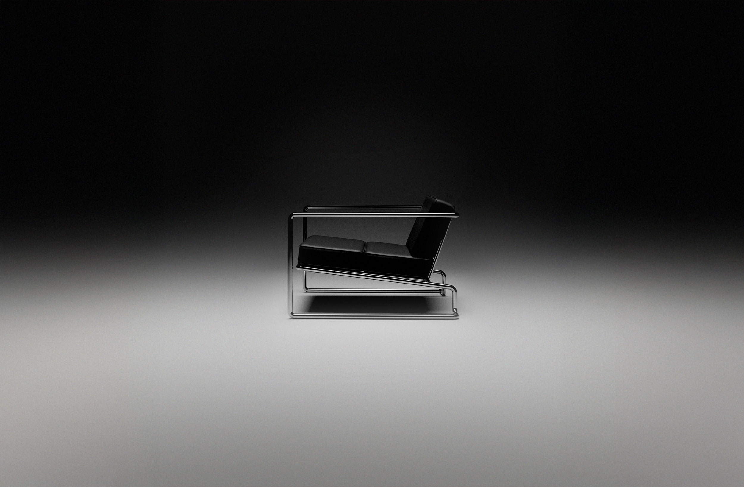 Modern black leather armchair with a chrome frame on a gradient background.