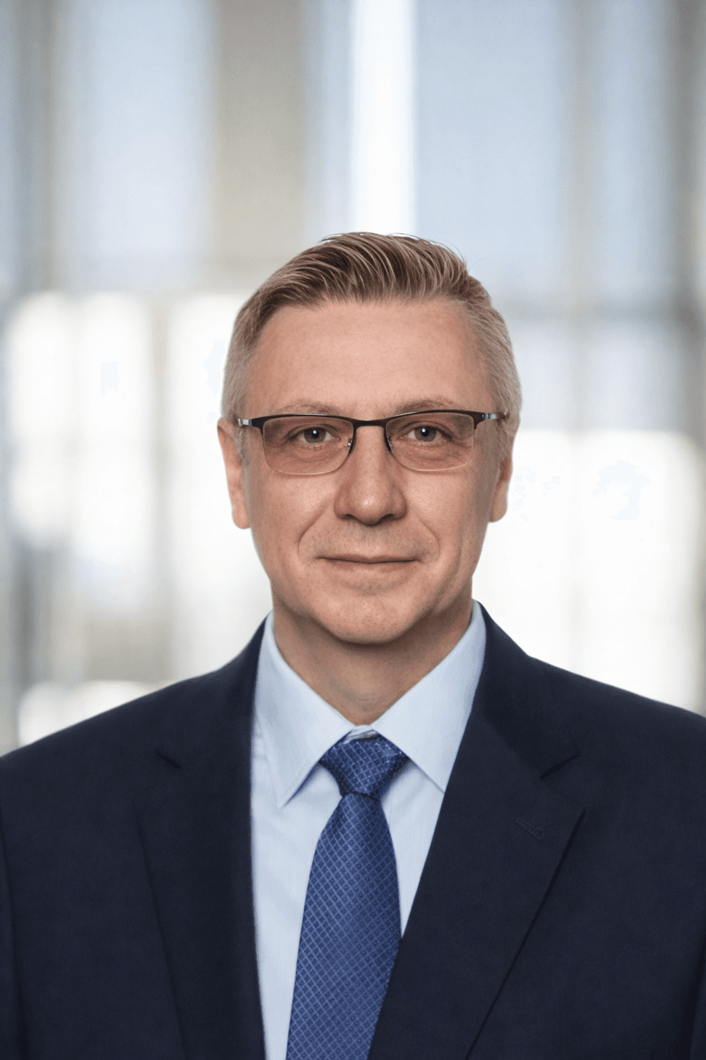 grayscale photo of woman wearing necklace and top