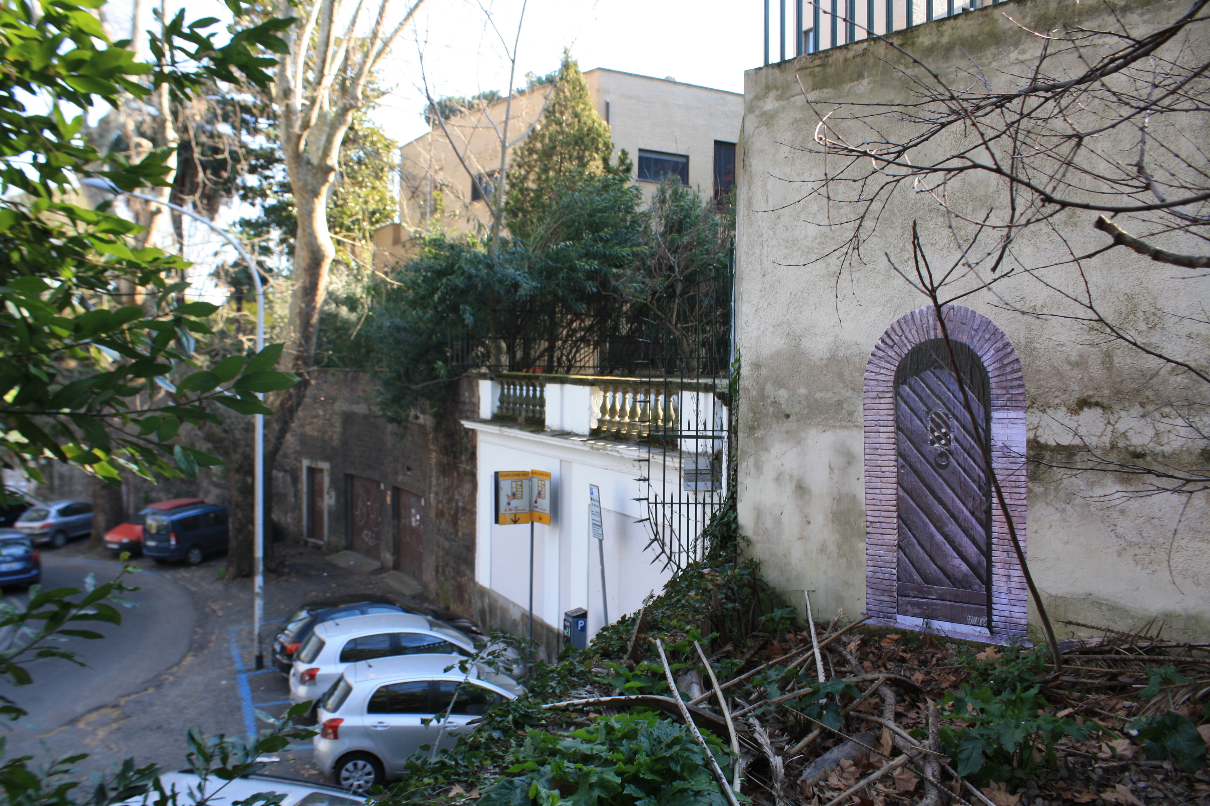 Collage on wall, Rome 2011