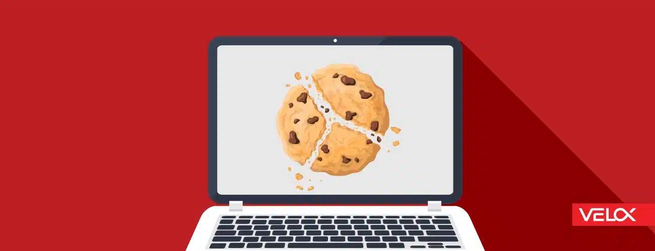 A red graphic of a laptop screen with a cookie on the screen