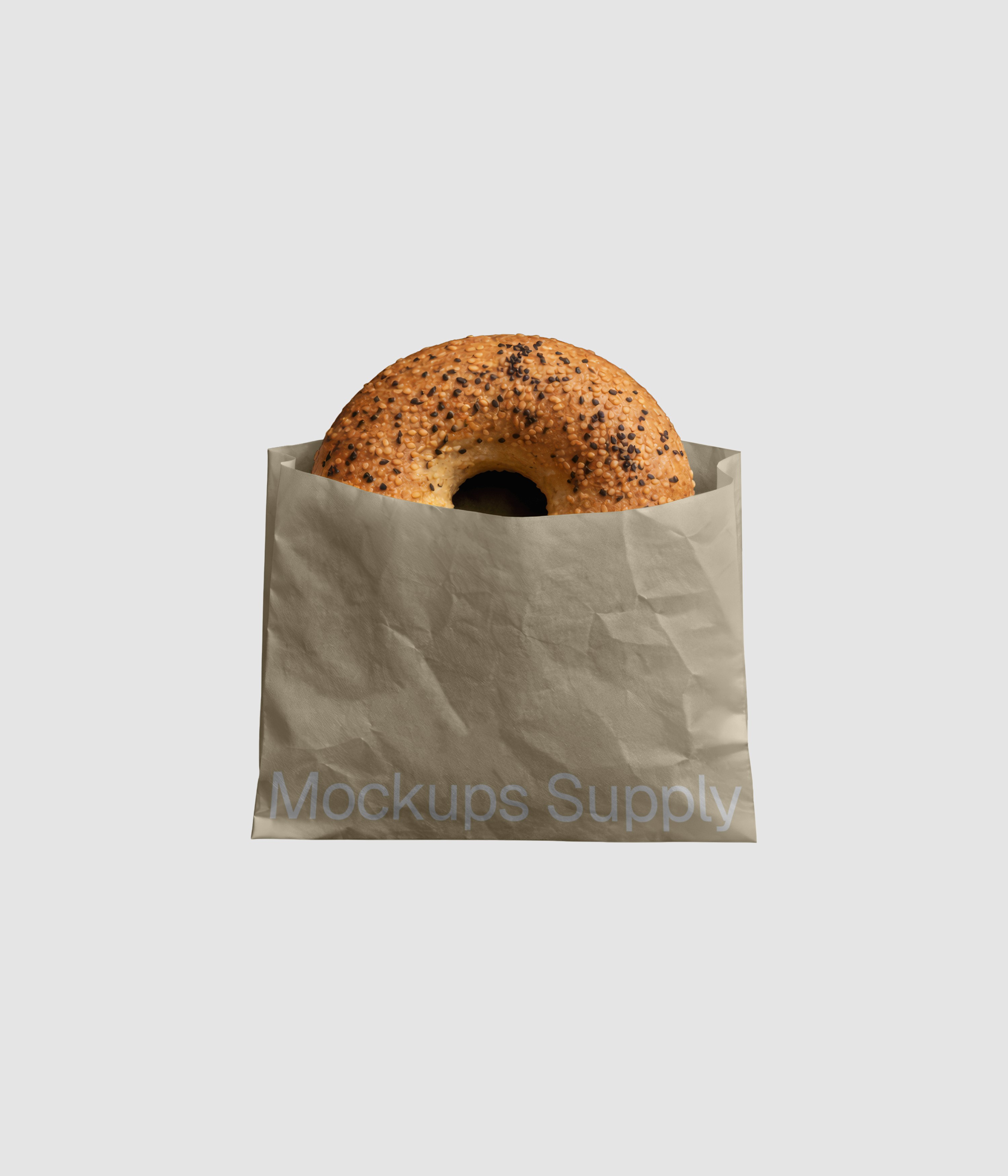 Bagel in beige paper bag mockup on gray background for Photoshop download psd