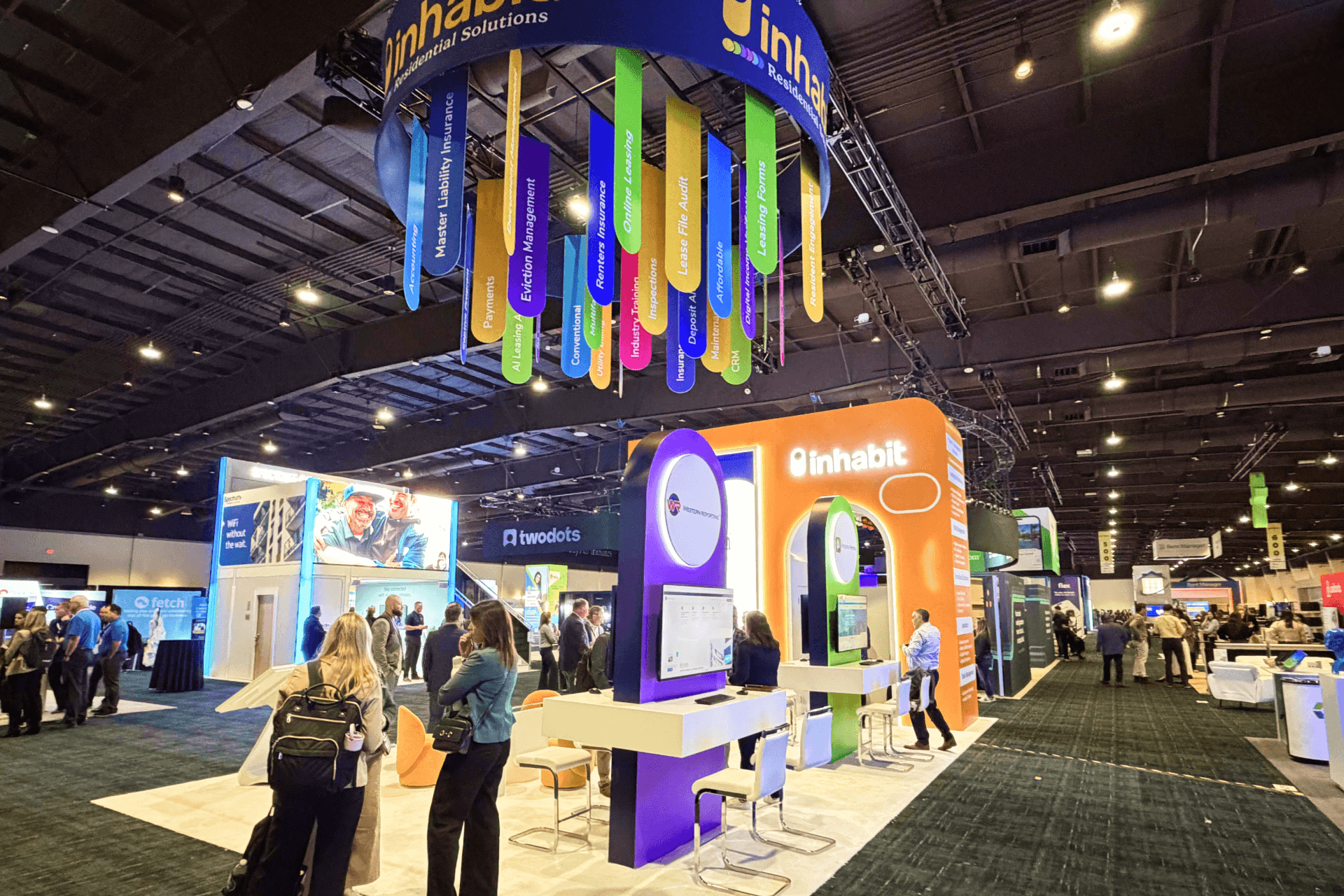 20x20 gaming technology exhibit booth with interactive display layout and casino systems presentation area for G2E Las Vegas