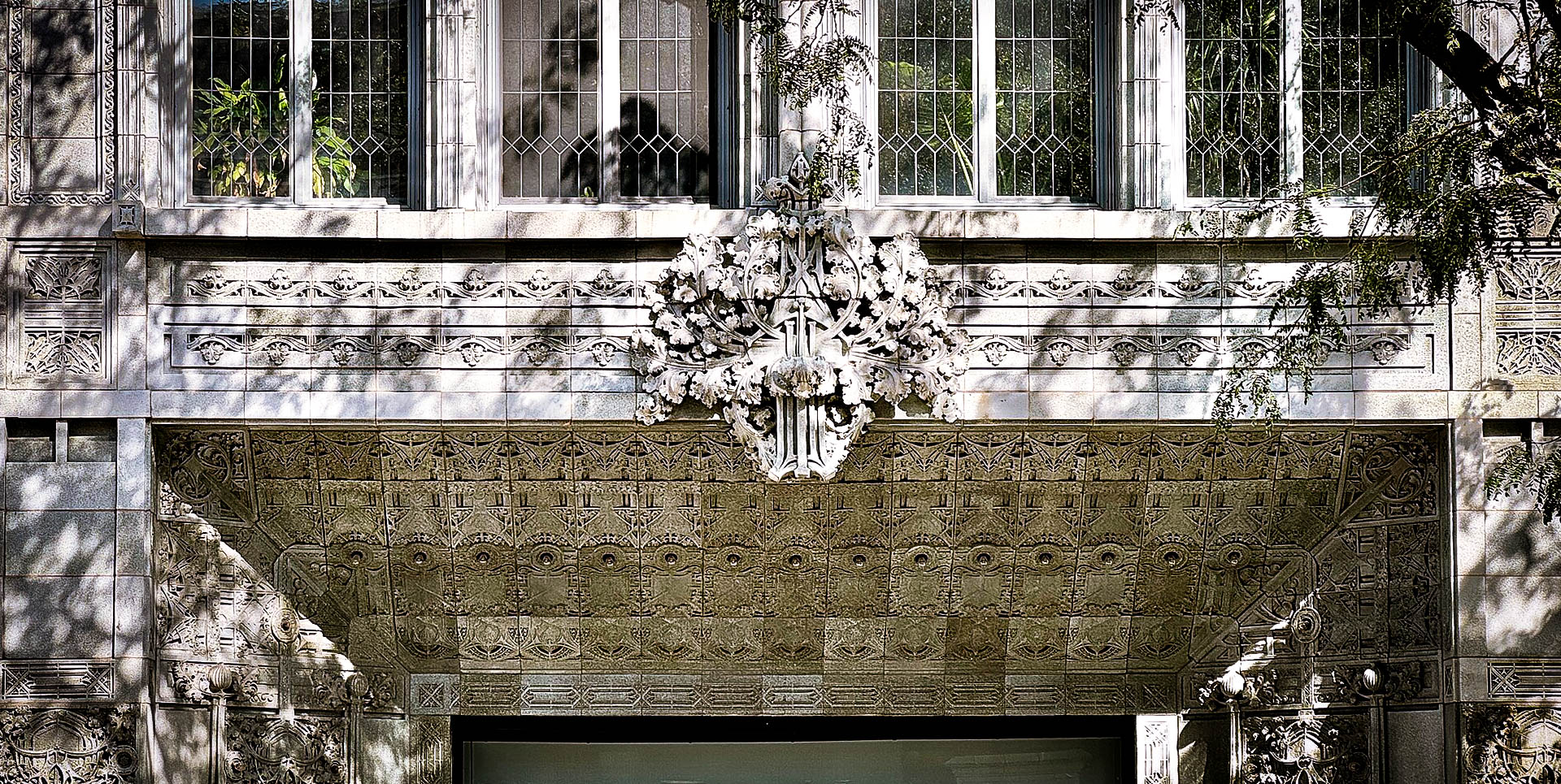 the outside of krause music store/hall in licoln square with ornate masonry work
