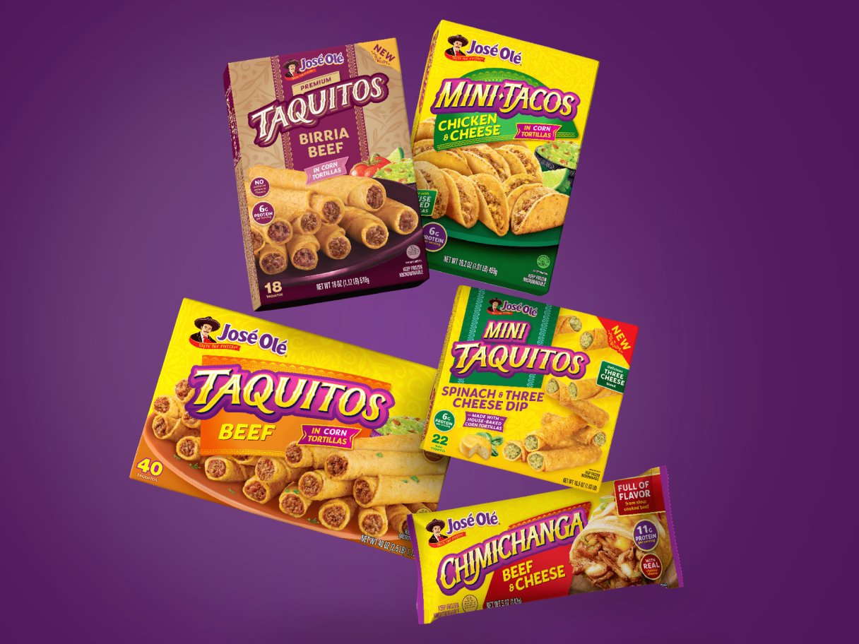 Rooftops of a coastal town with the sea in background