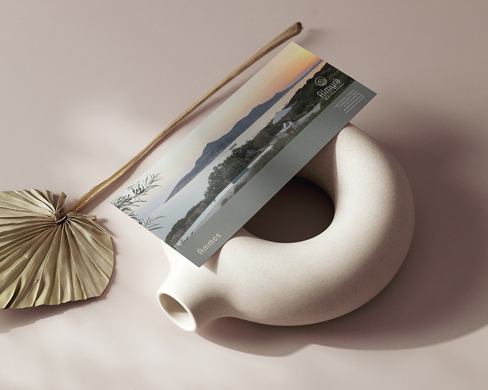 Almyra Antiparos branded brochure and printed hospitality collateral styled with decorative ceramic object