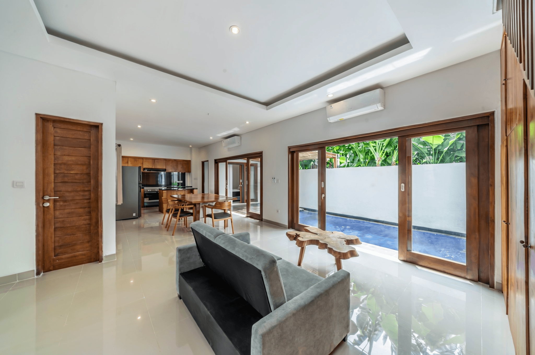 Open-plan living and dining area. Expert real estate support for high-end residential properties in Kerobokan.