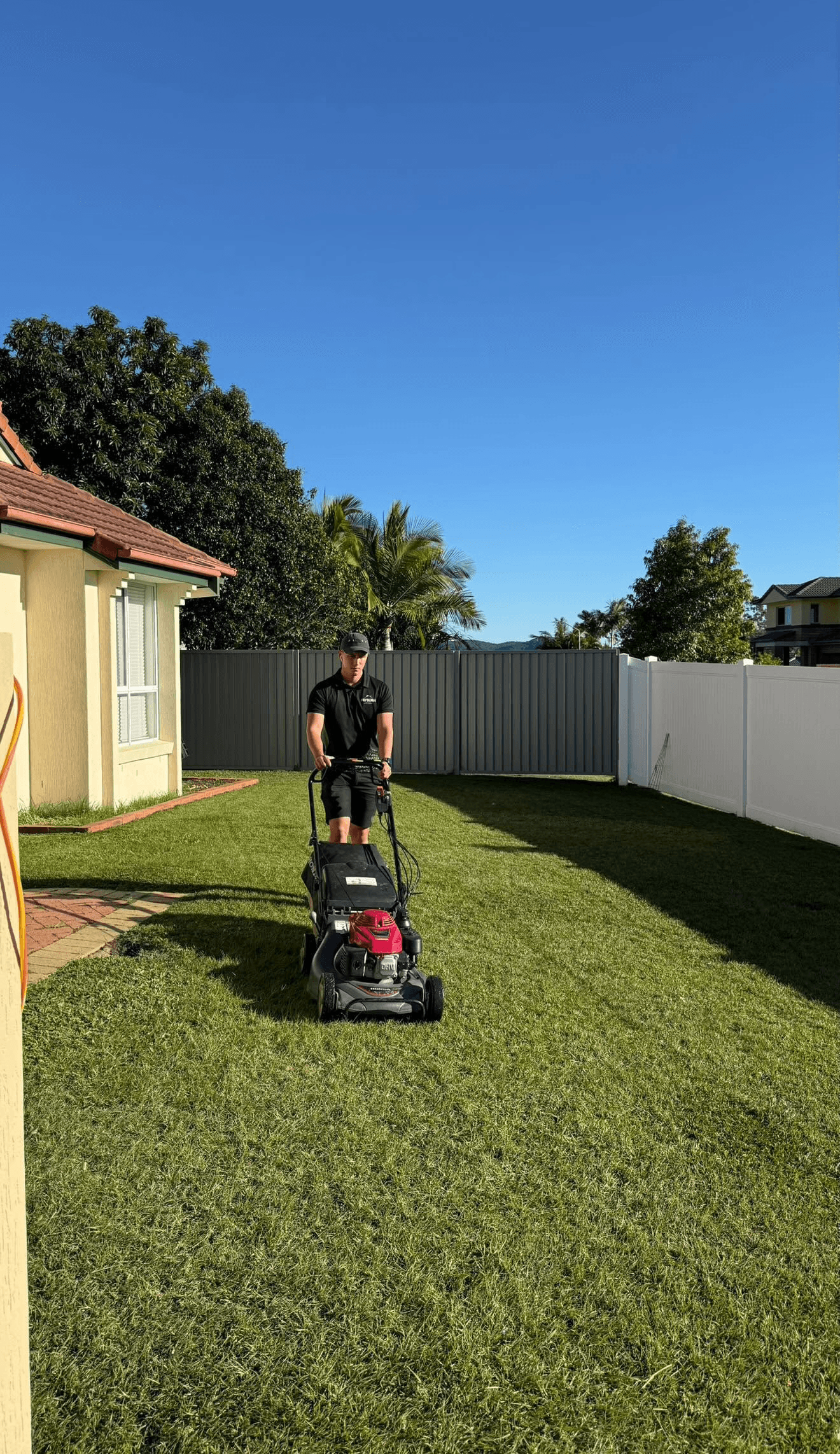 Residential lawn mowing service completed backyard Gold Coast Hepburn Property Maintenance