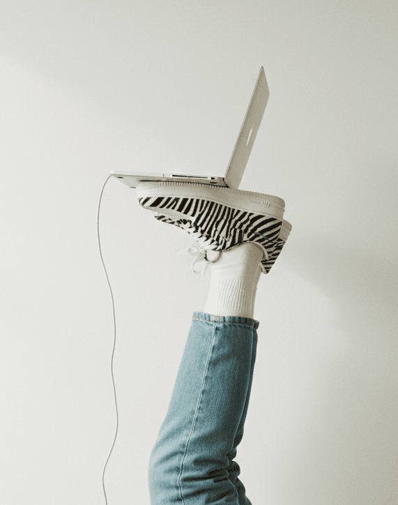 Laptop balancing on funky shoes