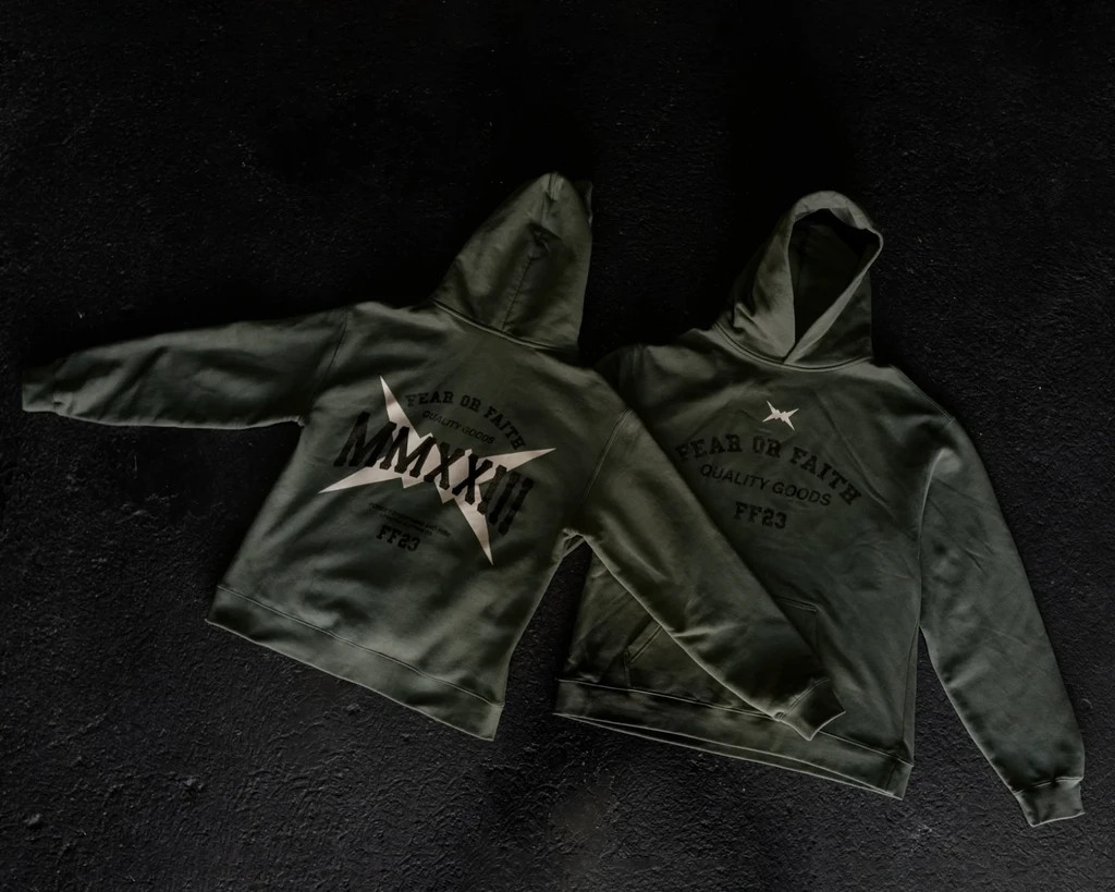 Two of the same green hoodie showing front and back design.