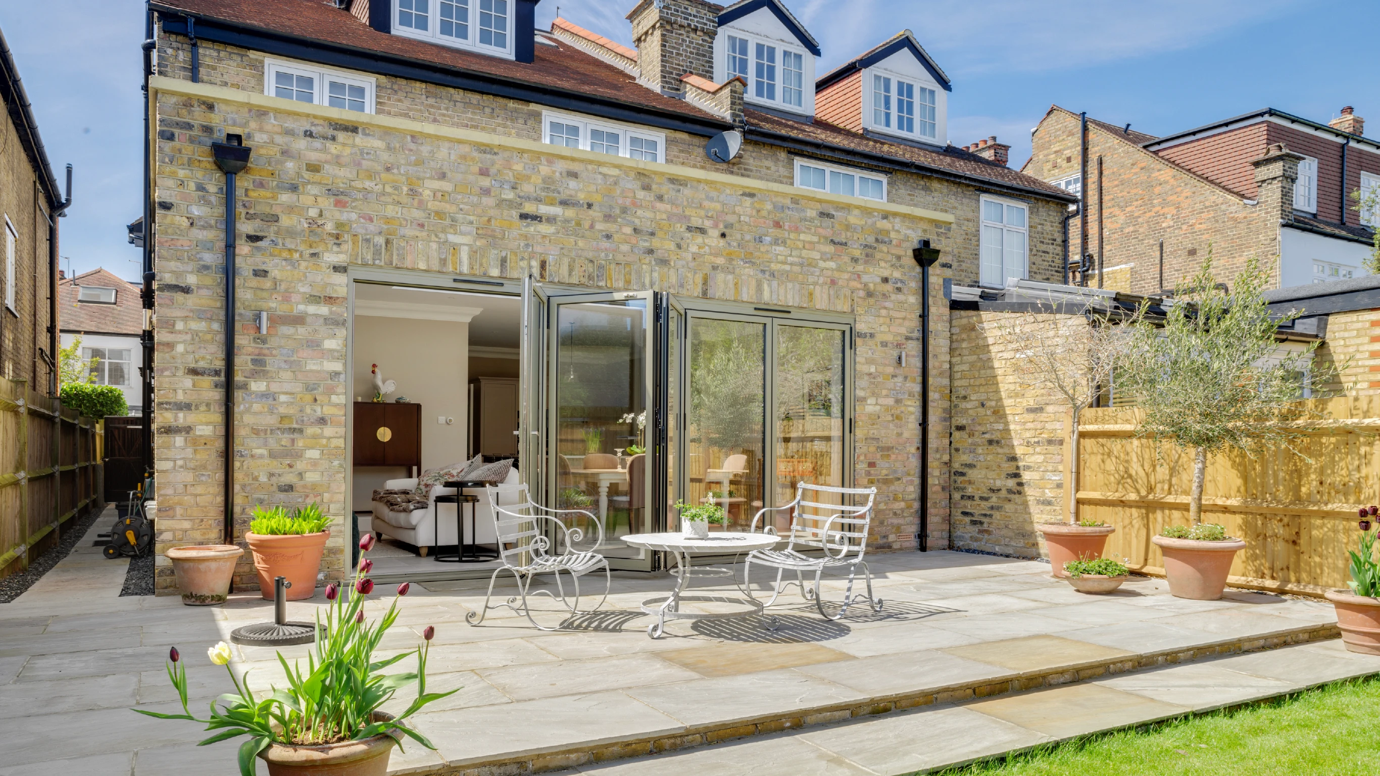 Ferry Road rear exterior shot of patio and brickwork extension