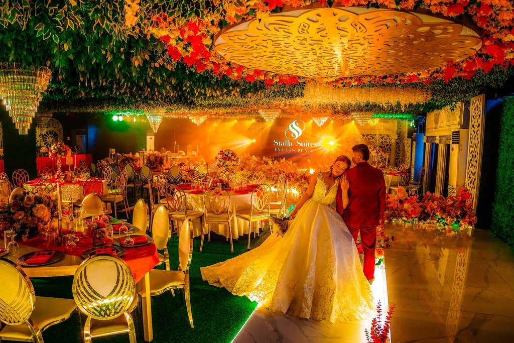 Couple in the warm candlelit reception of Pandora Hall, Quezon City
