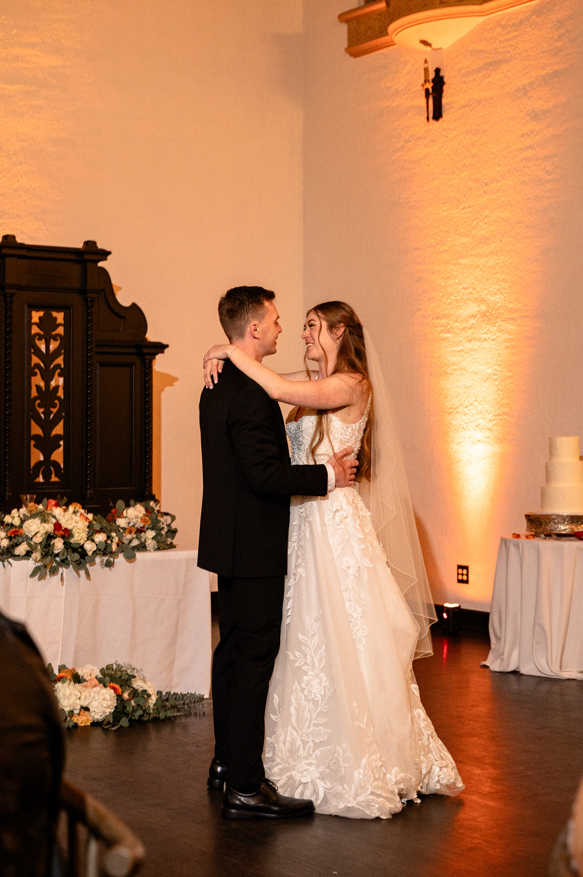 Flat lay wedding details with bouquet, rings, and sparkling bridal heels