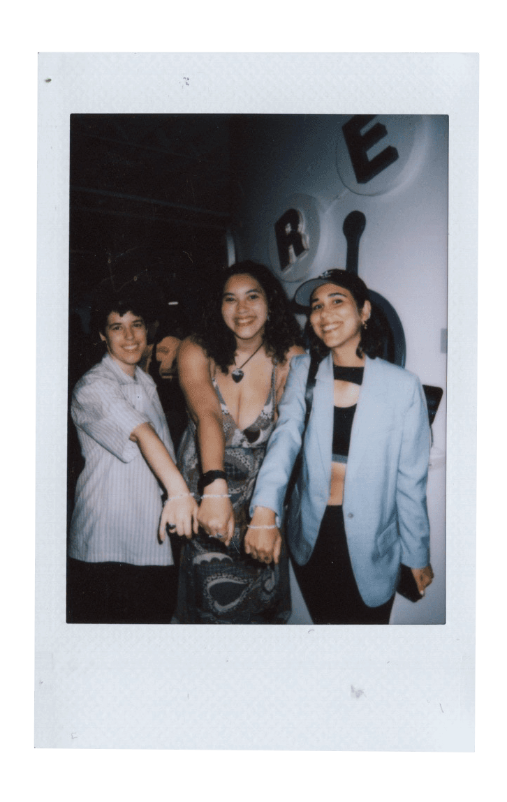 Fujifilm photo of girls holding a friendship bracelet
