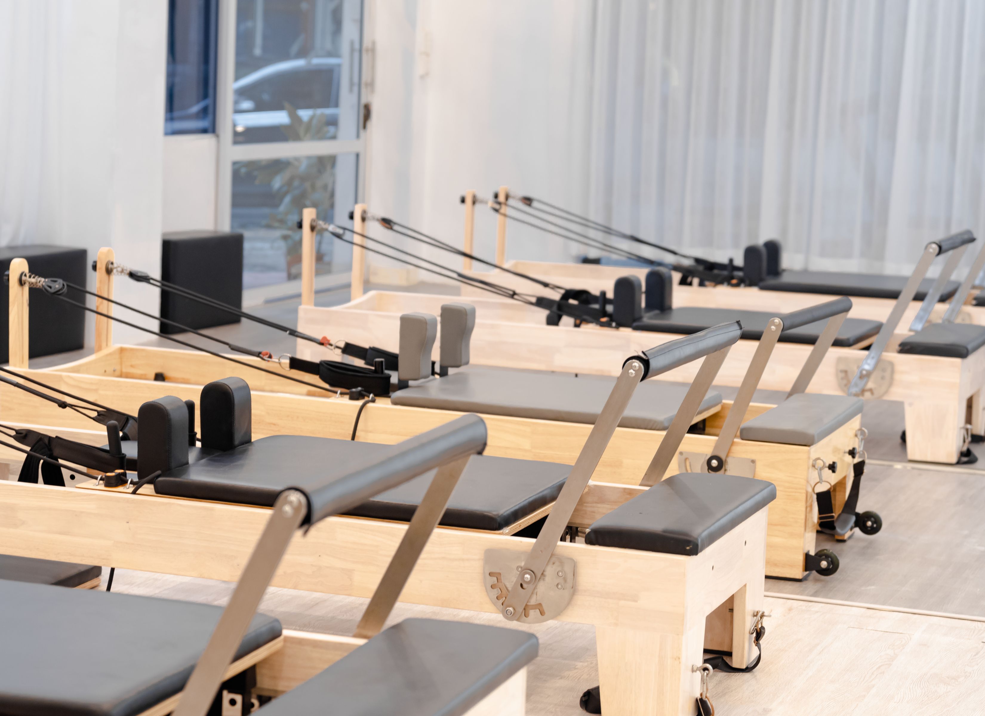 Full Clarity Consultancy - Ed, founder, sat at his desk, looking at a mockup on the wall.