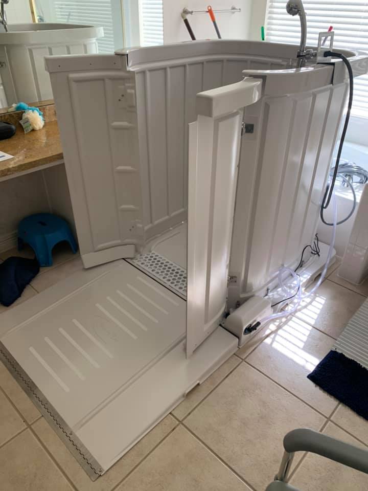 LiveWell portable shower set up in a home