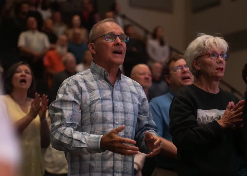 Man and wife during congregational worship
