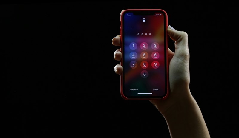 image of locked phone in hand