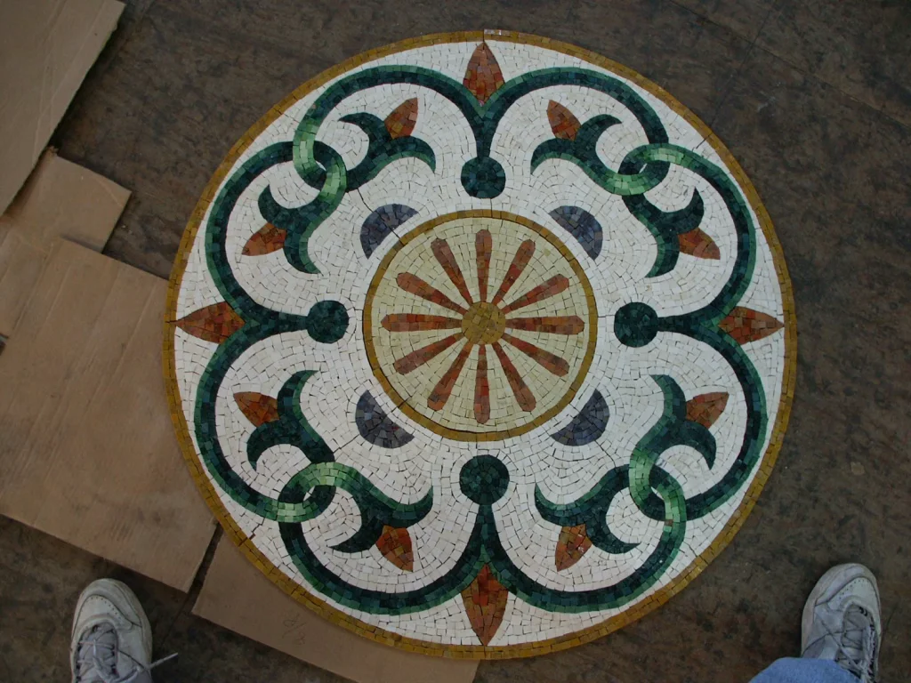 Quatrefoil Sunburst mosaic pool medallion, Green and gold on white, hand-cut stone — reference M-05, Mosaiclegs Art Studio