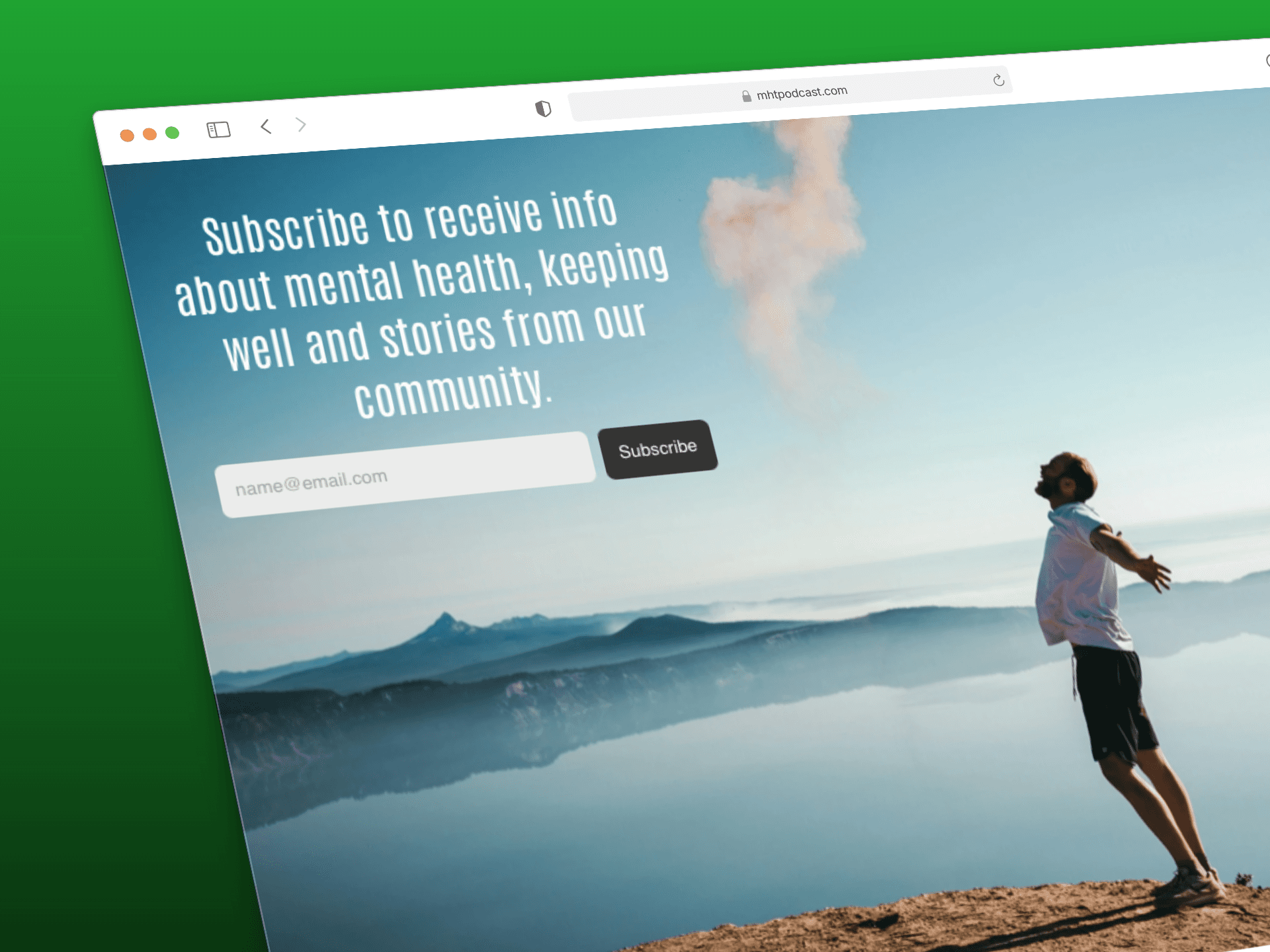A laptop on a neutral desk displays the Mental Health Today homepage featuring a serene coastal image of a woman standing by the ocean.