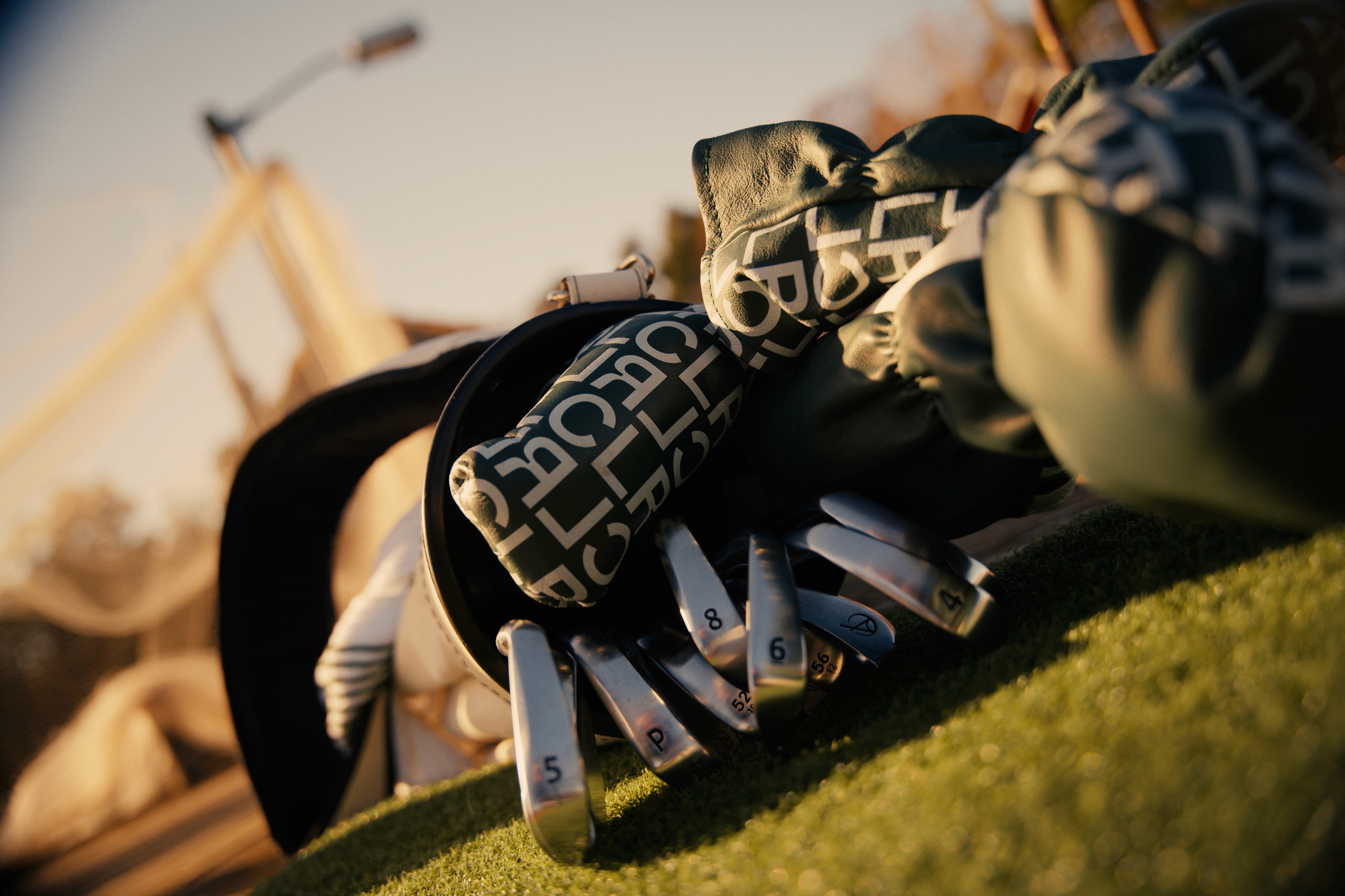 Streetside billboard with flyposters of the Batch.Works brand and illustrations