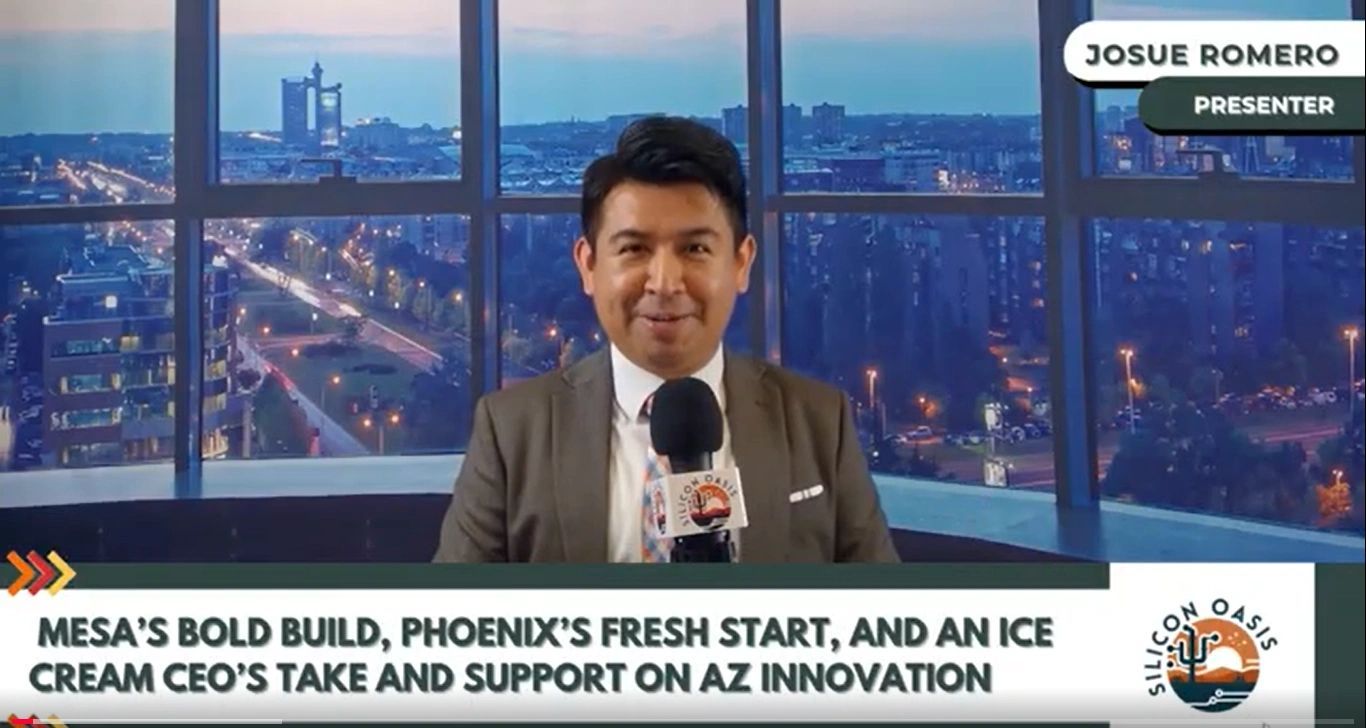 a black and white living room with a large tv