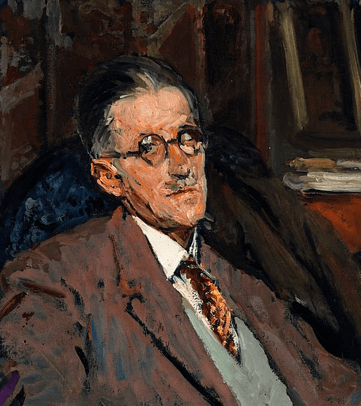 man in brown button up long sleeve shirt holding black smartphone