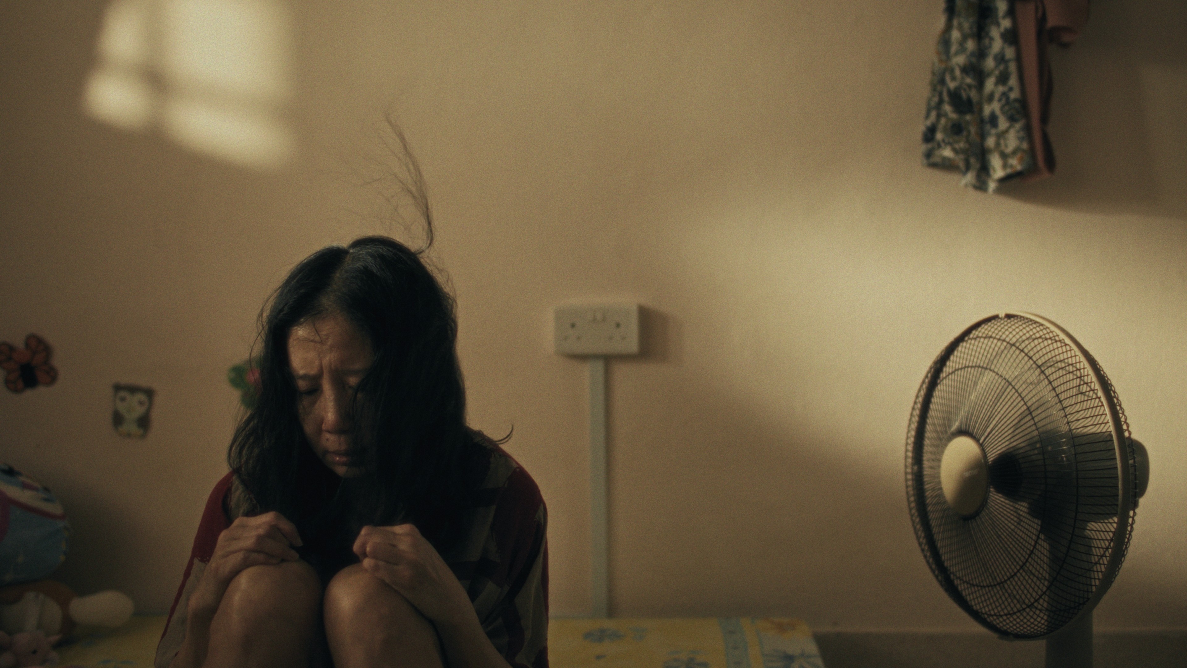 Mirage Still 5: Amy reflects alone in the bedroom.