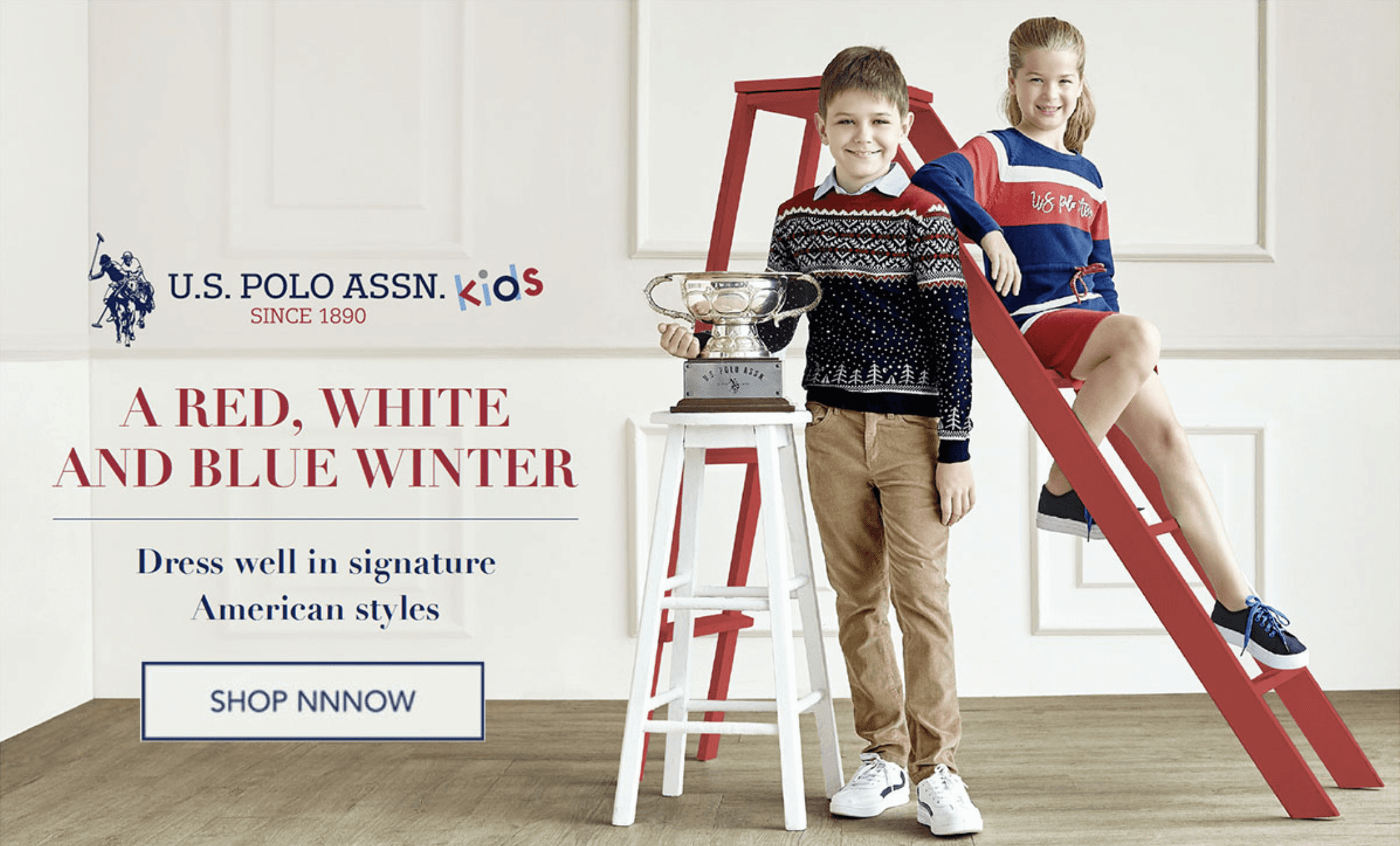 People playing soccer on a rooftop court surrounded by city buildings