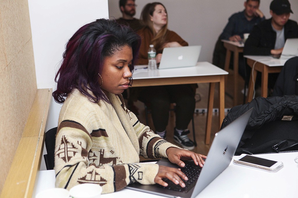 A team in a focused timebox, converging on a direction after wide-ranging exploration.