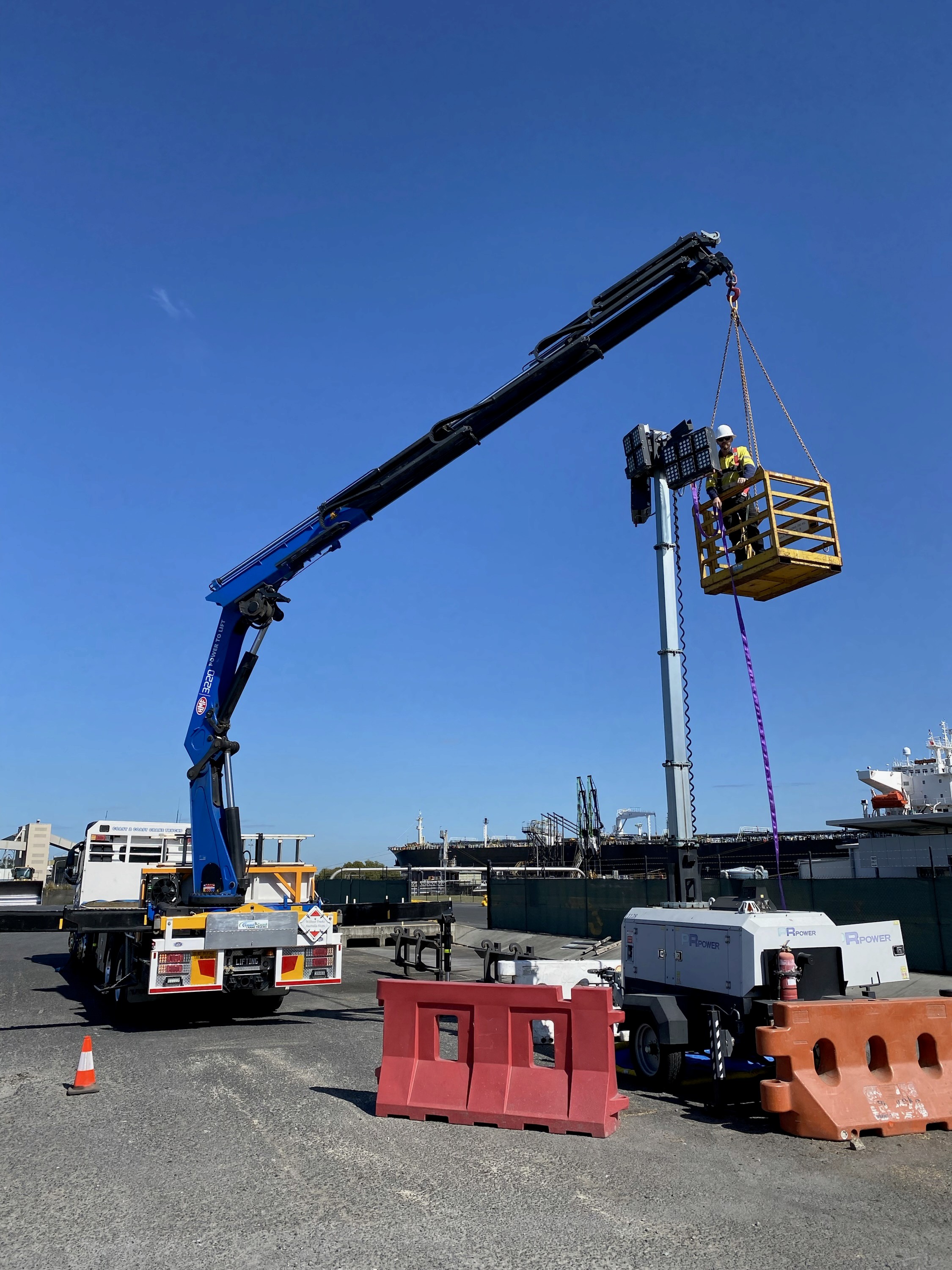 Crane truck with man cage