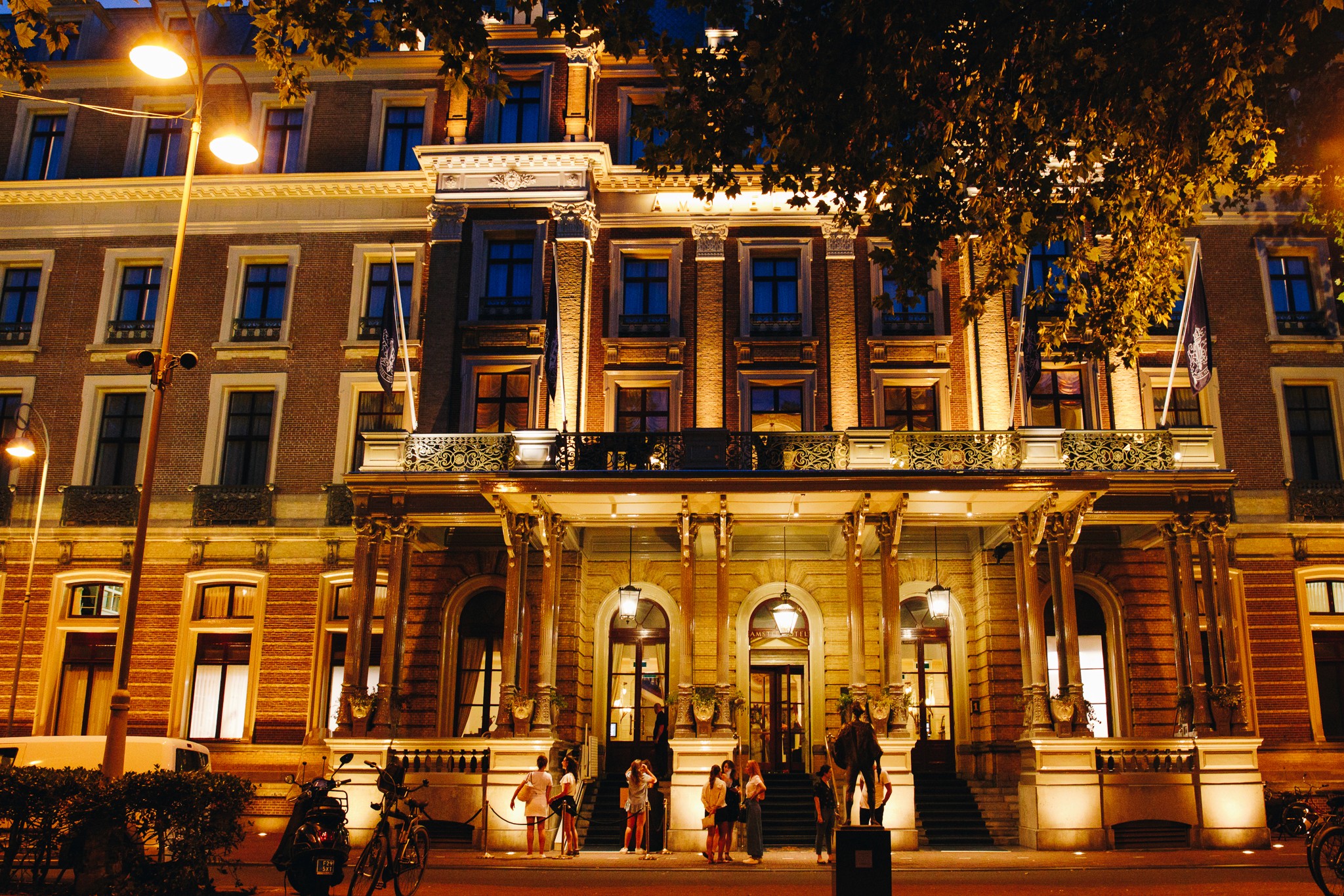 Streetside billboard with flyposters of the Batch.Works brand and illustrations