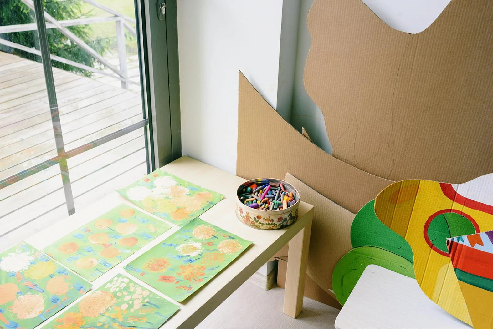 Sunlit preschool classroom with fresh air and natural greenery for a healthy learning environment