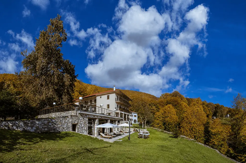 Manthos Mountain Resort & Spa surrounded by autumn woodland in Pelion