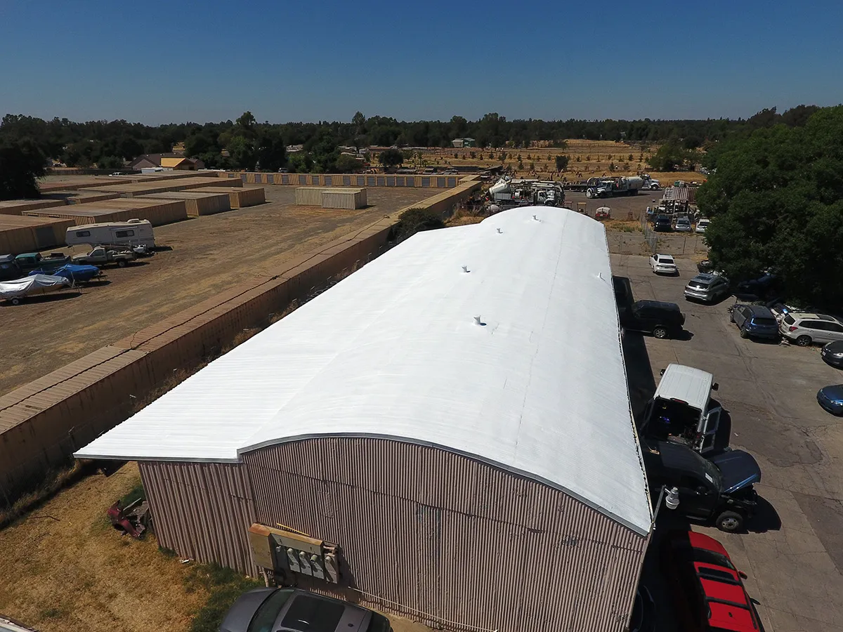 New spray foam roofing system with acrylic coatings