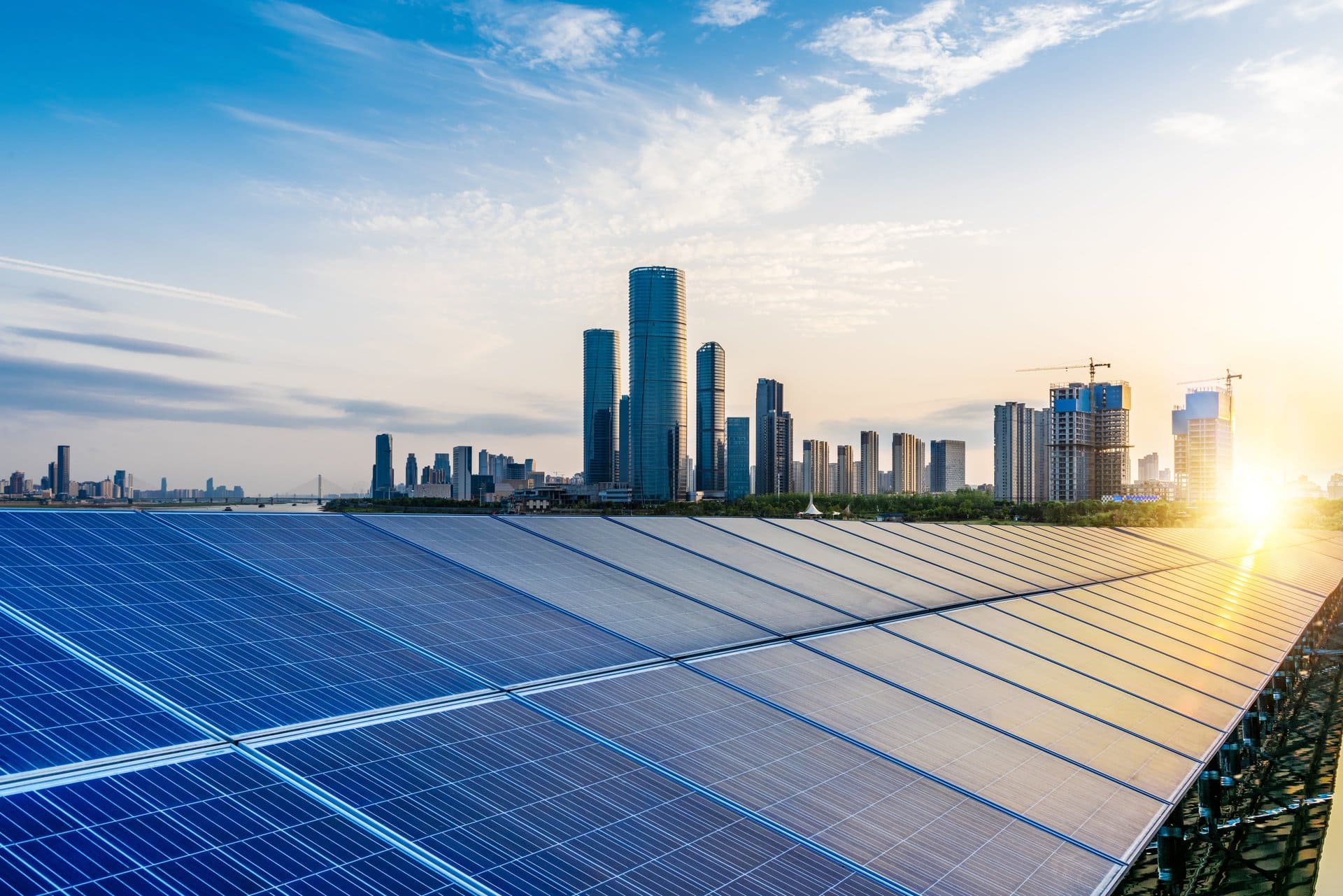 Solar panels with a city skyline