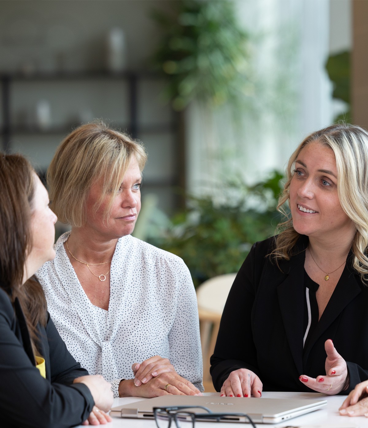 Members of the C6 Med team in a meeting discussing a project