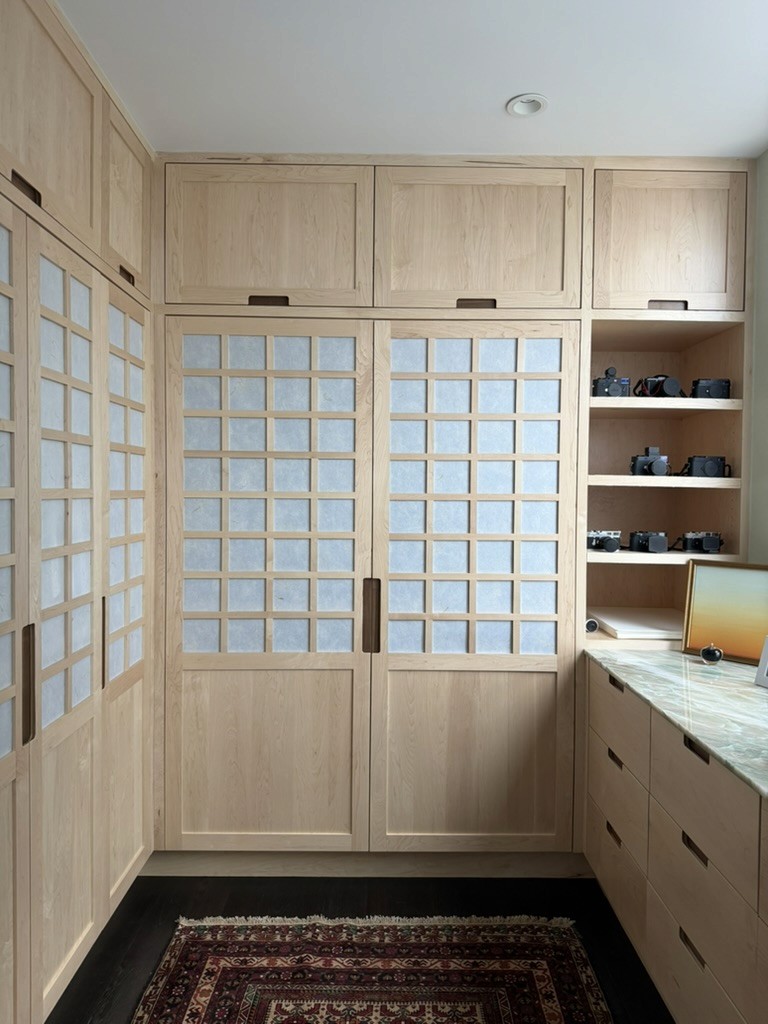 Shoji style doors add a textural element and romance to the space, through incorporation of silk.