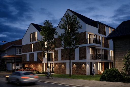 Nachtaufnahme der beiden modernen Wohngebäude des Projekts Urban711 von der Bahnhofstraße in Remshalden aus gesehen. Die beleuchteten Fassaden und Fenster spiegeln städtischen Komfort in naturnaher Lage wider.
