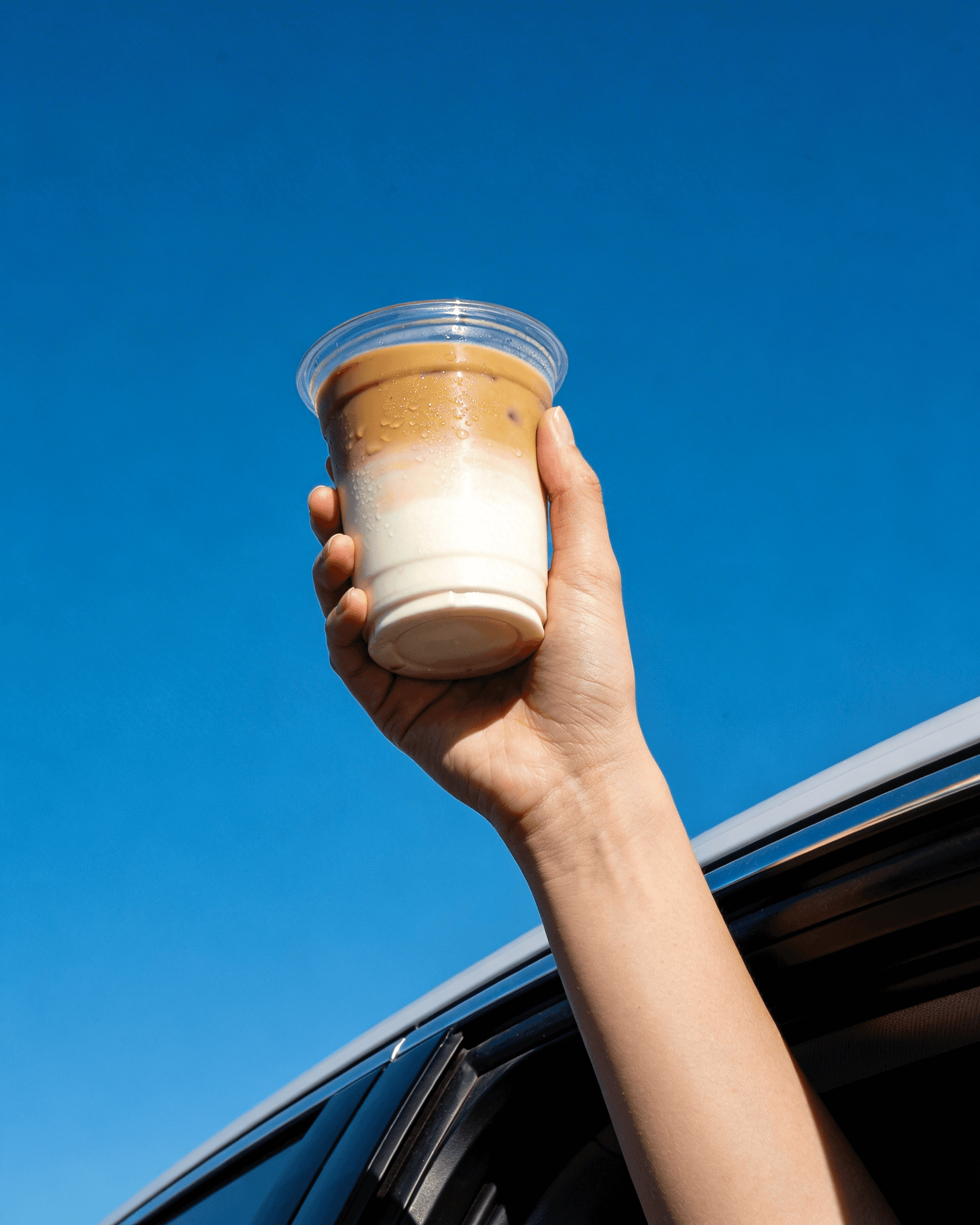 Iced Coffee in Hand