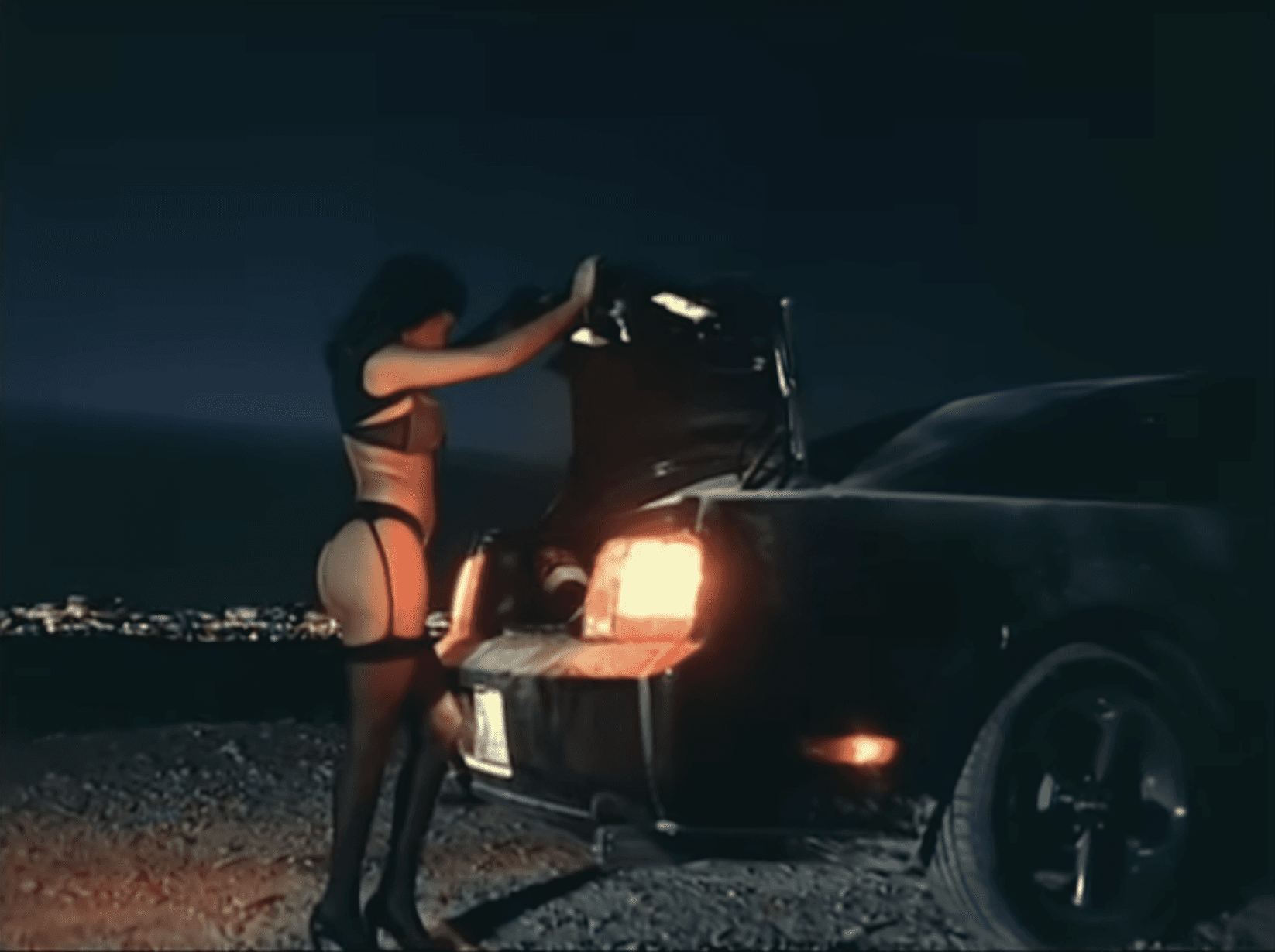 Modern architectural walkway with angled roof and sunlight.