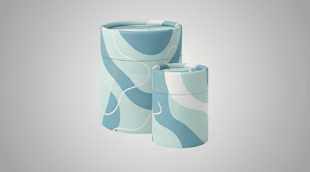 Two cardboard tubes with a abstract blue pattern on it with different shades of blue and white on it.