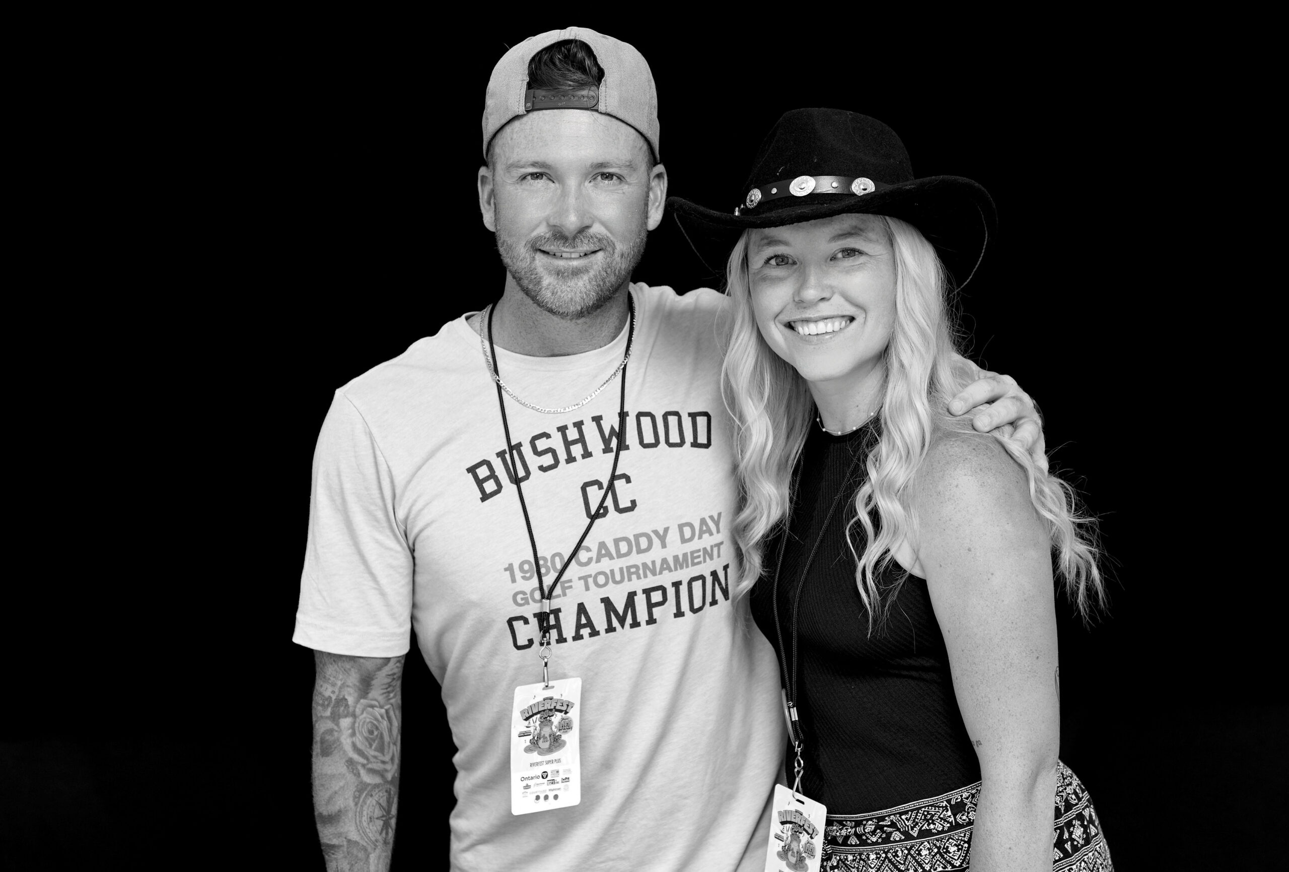 Elegant guests embracing in black and white