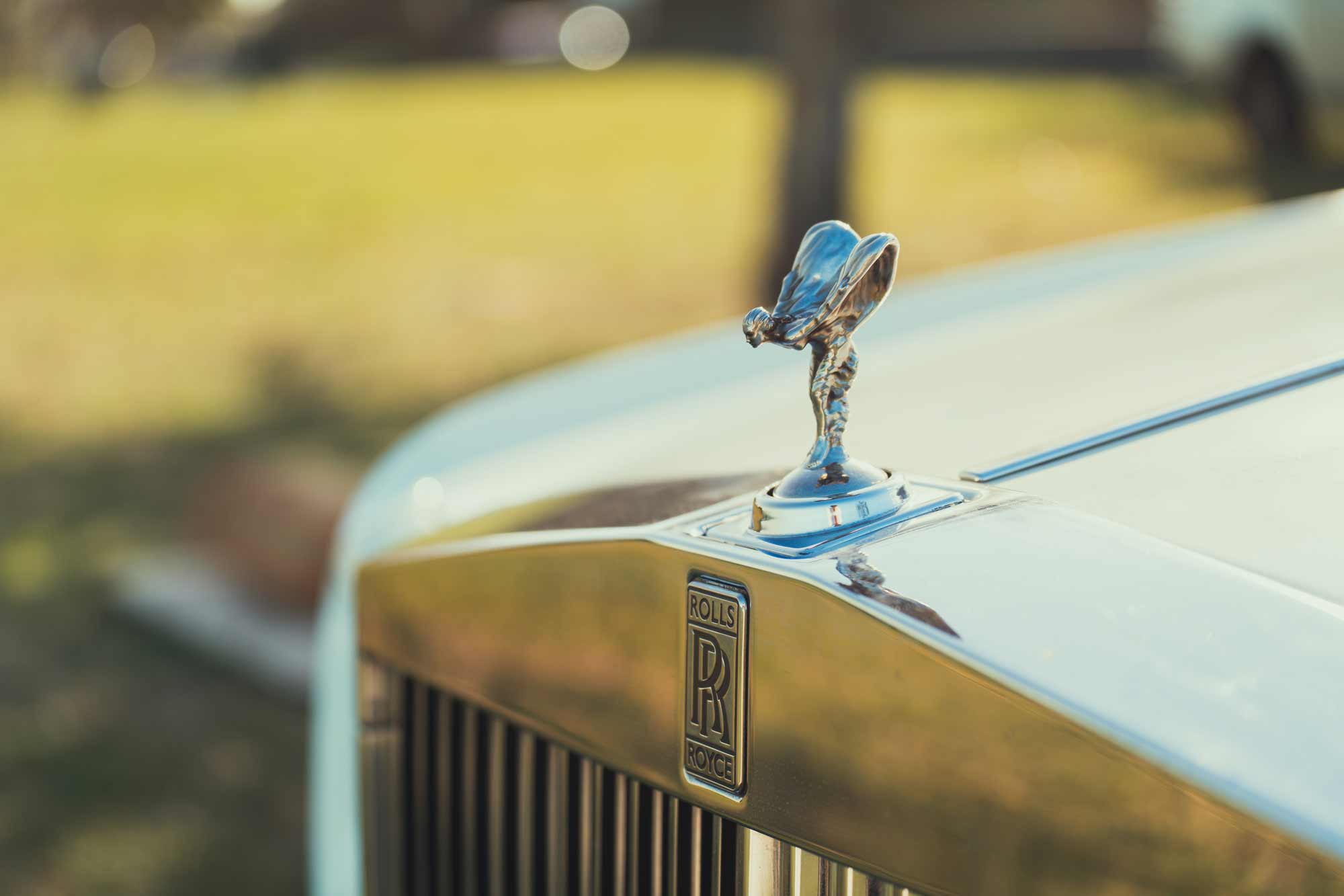 Rolls-Royce emblem detail; ideal for filmproduction and advertising campaigns.