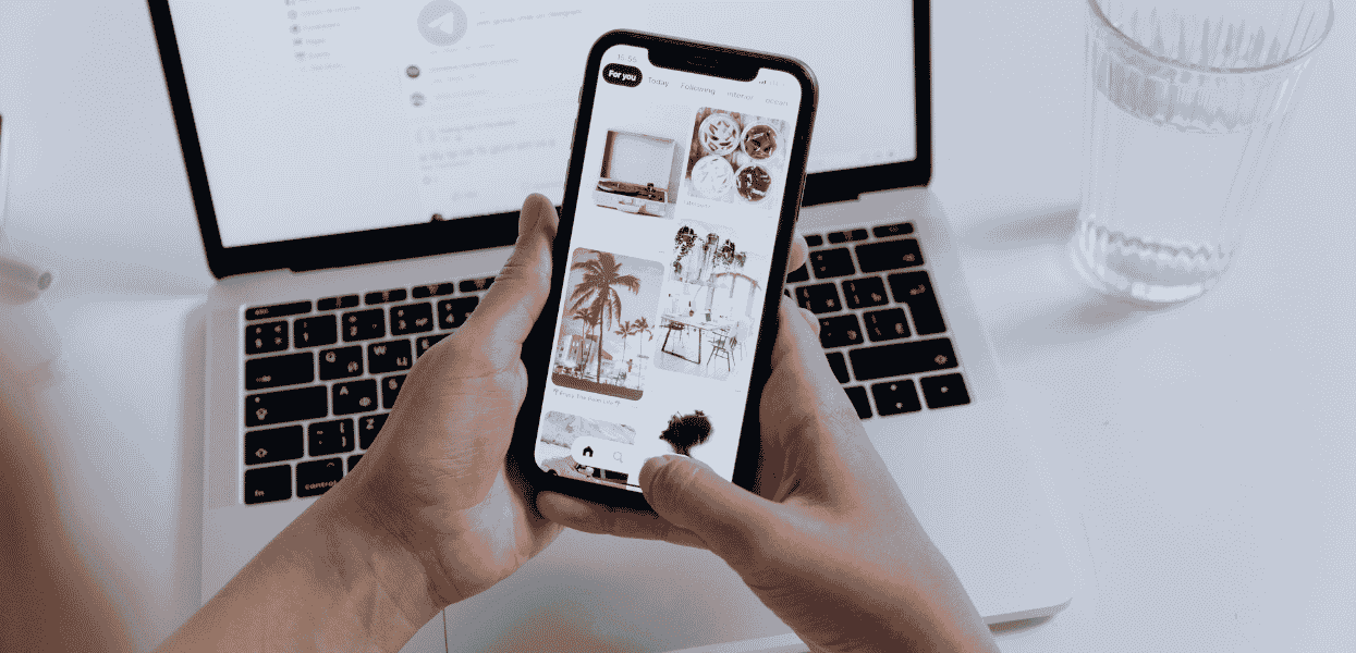 Mobile device being used to look at Instagram for the Instagram Marketing for Local Brand Awareness blog pose by Brand Champions