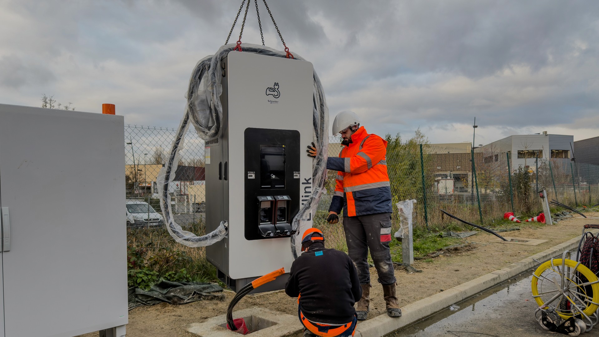 a group of construction workers working on a building