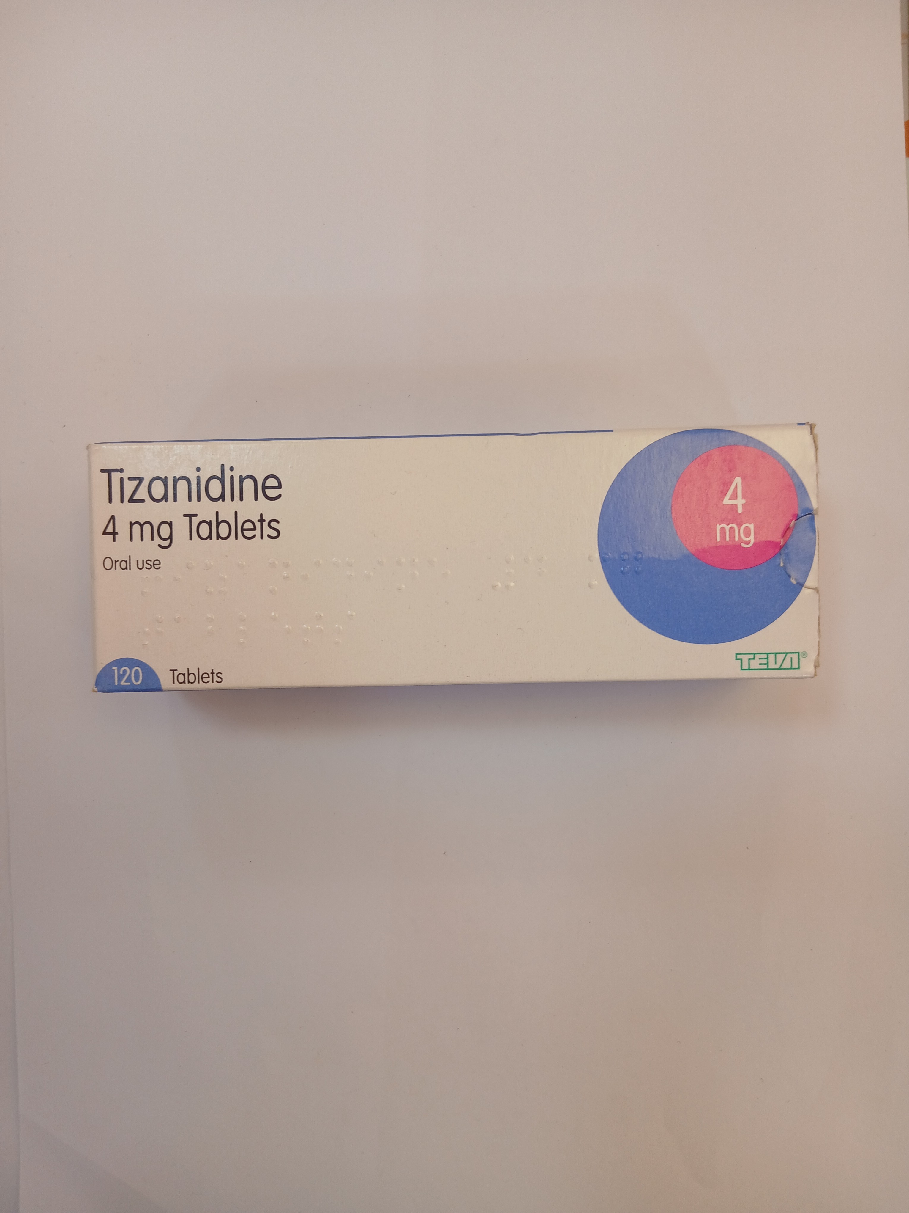 White cardboard box packaging displays a circular graphic with blue and red sections indicating "4 mg" dosage, and text stating "4 mg Tablets" with "10 tablets" noted on the side.