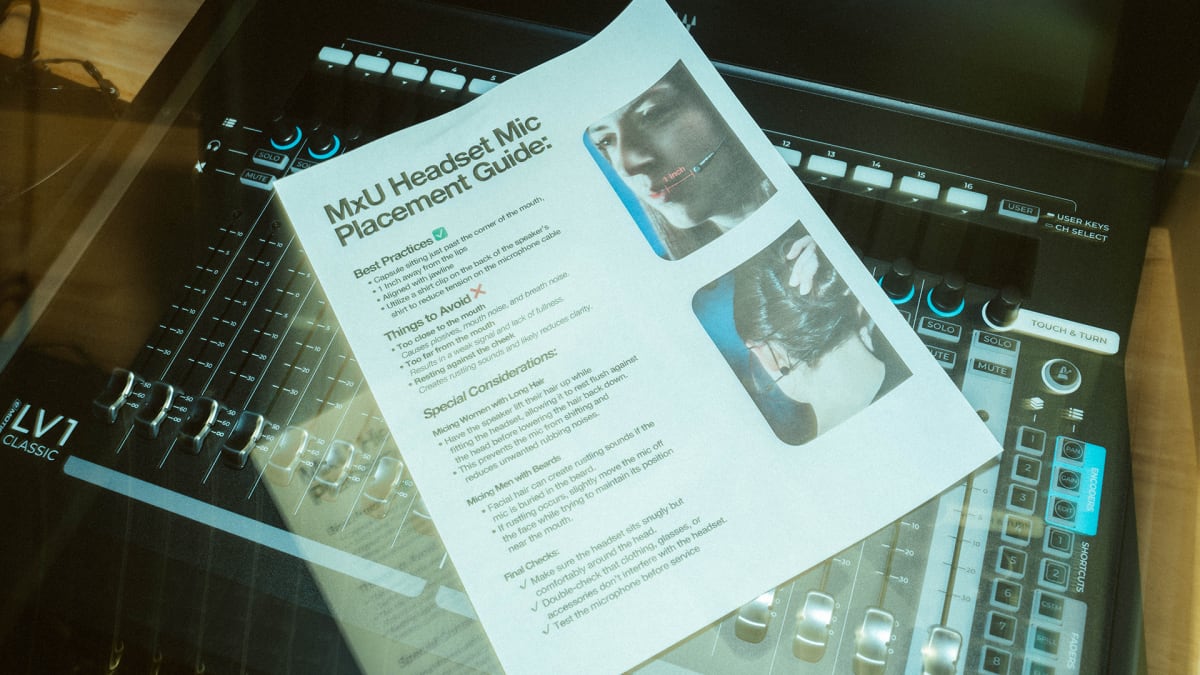 Cover image for the MxU worship resource 'Headset Placement Guide': a printed guide with text and two photos lies on an audio mixing console.