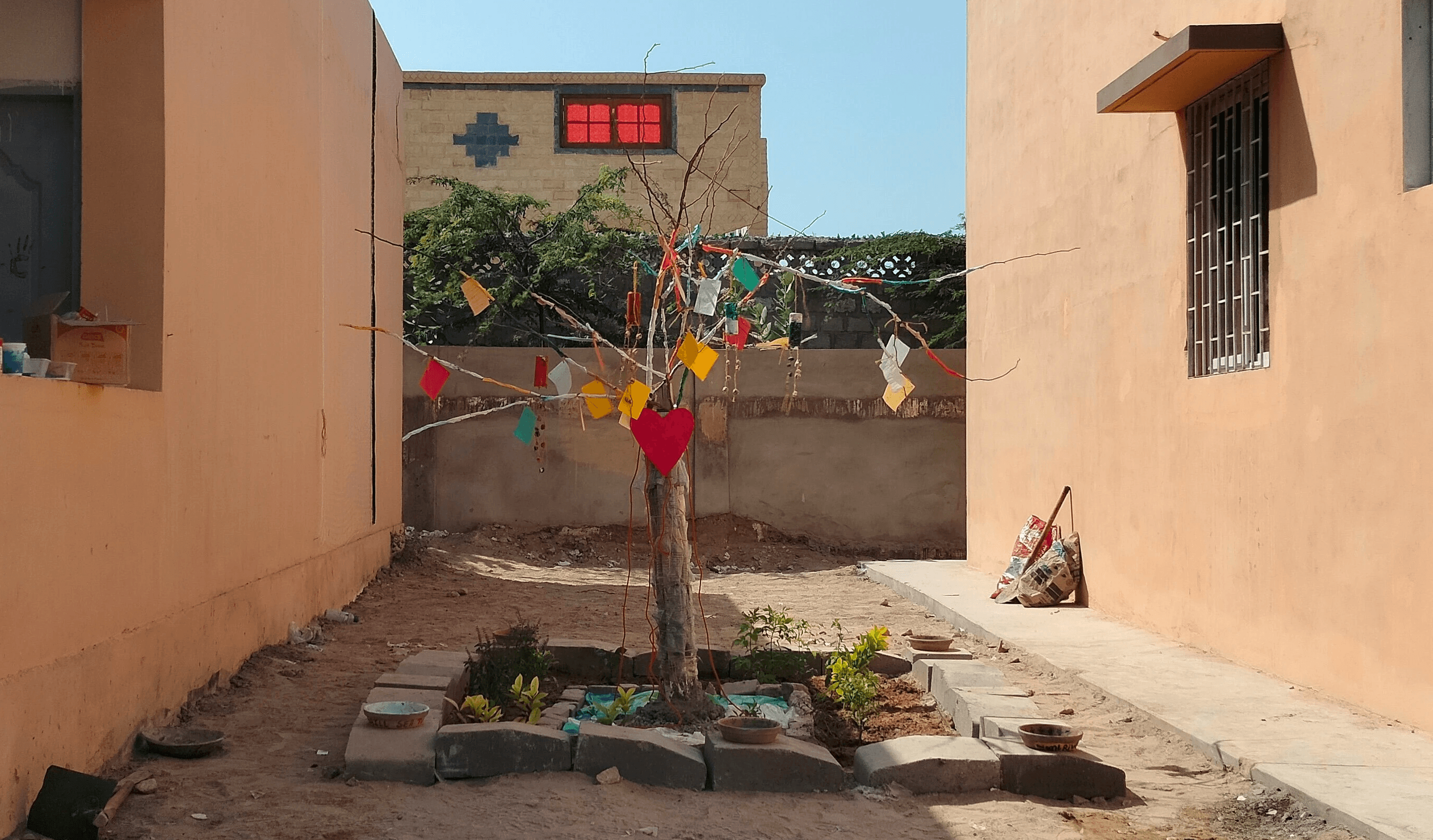 The "CFAW Mangroves Project Tree", made of sticky notes, cardboard hearts, and tied up chart paper in the branches.