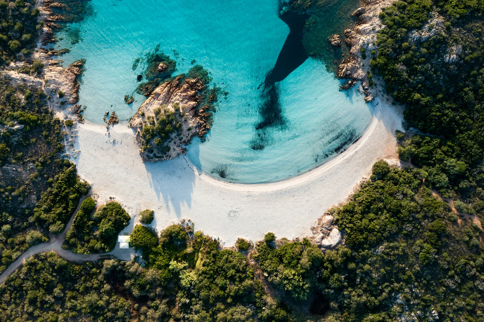 Rocky Sardinian coast above clear Mediterranean water