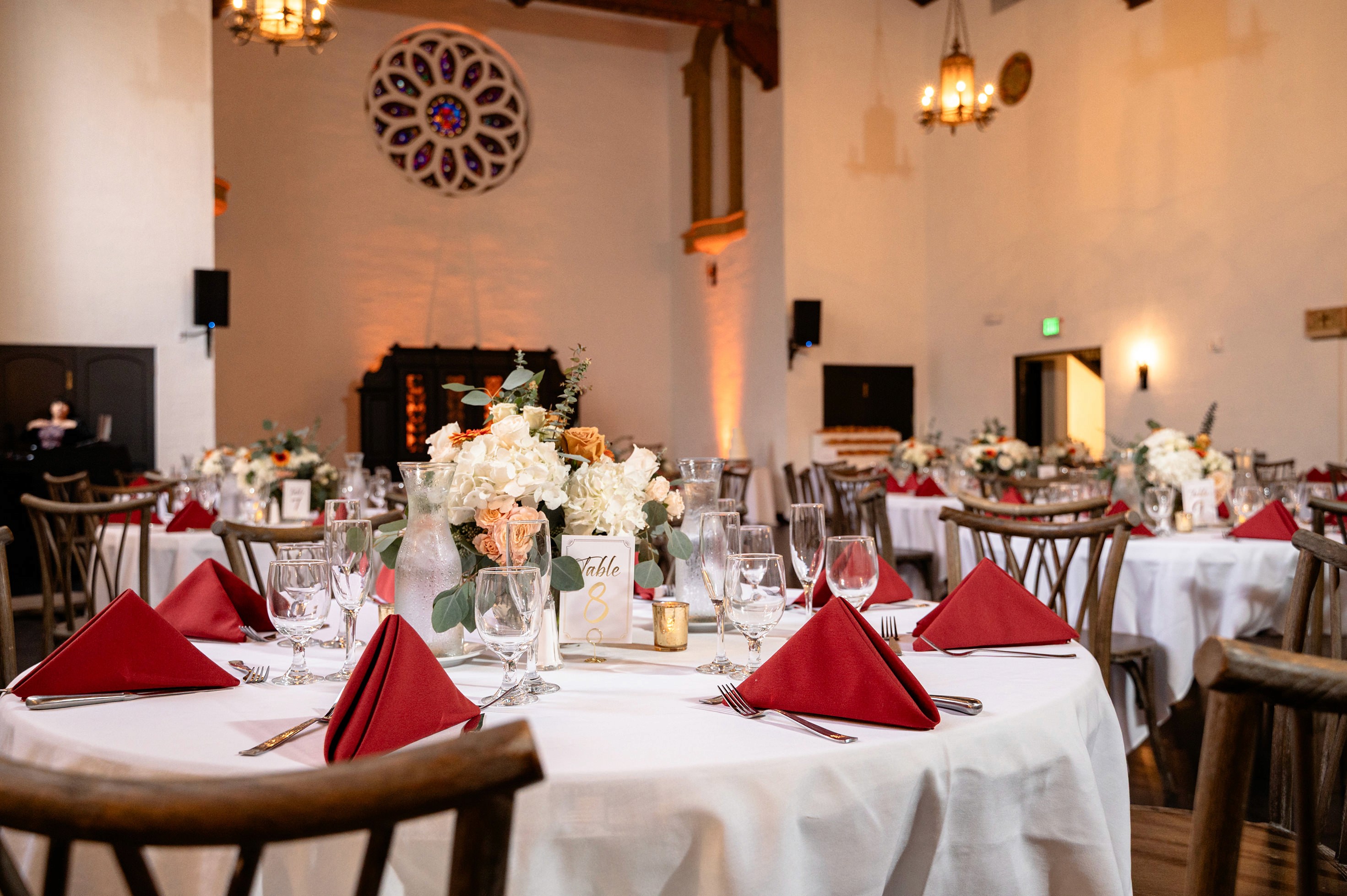 Flat lay wedding details with bouquet, rings, and sparkling bridal heels